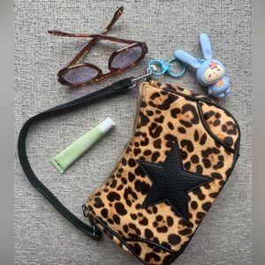 NWT animal print handbag with blue bag charm